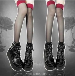 Black matte punk platform combat boots front lower leg view with sheer red top stockings rivet details