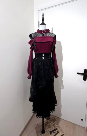 Black mermaid fishtail Jirai Kei skirt with delicate lace veil detail and criss-cross side ties front view display