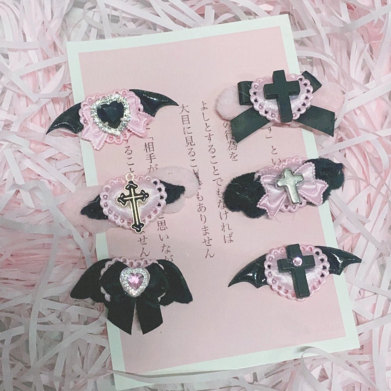 Black pink random one jirai kei hair clip selection with striking monochrome and pink contrast demonic charm aesthetic