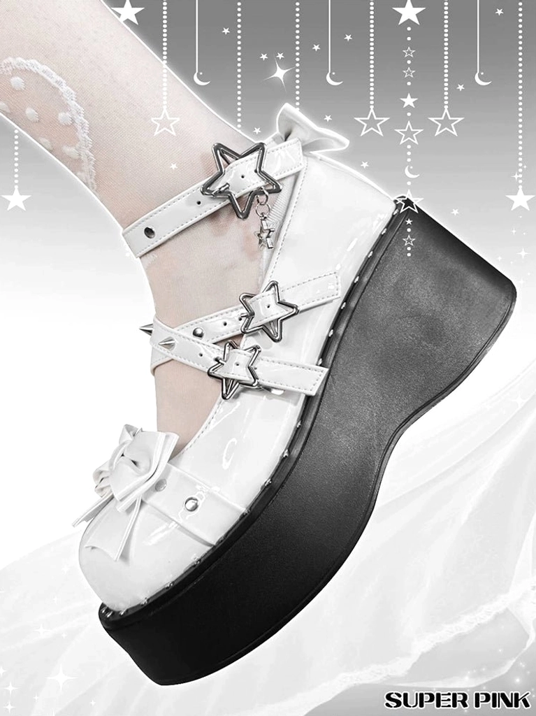 Black platform Mary Jane Jirai Kei shoes material close-up showing patent leather texture, star-shaped buckle hardware, and studded strap construction details