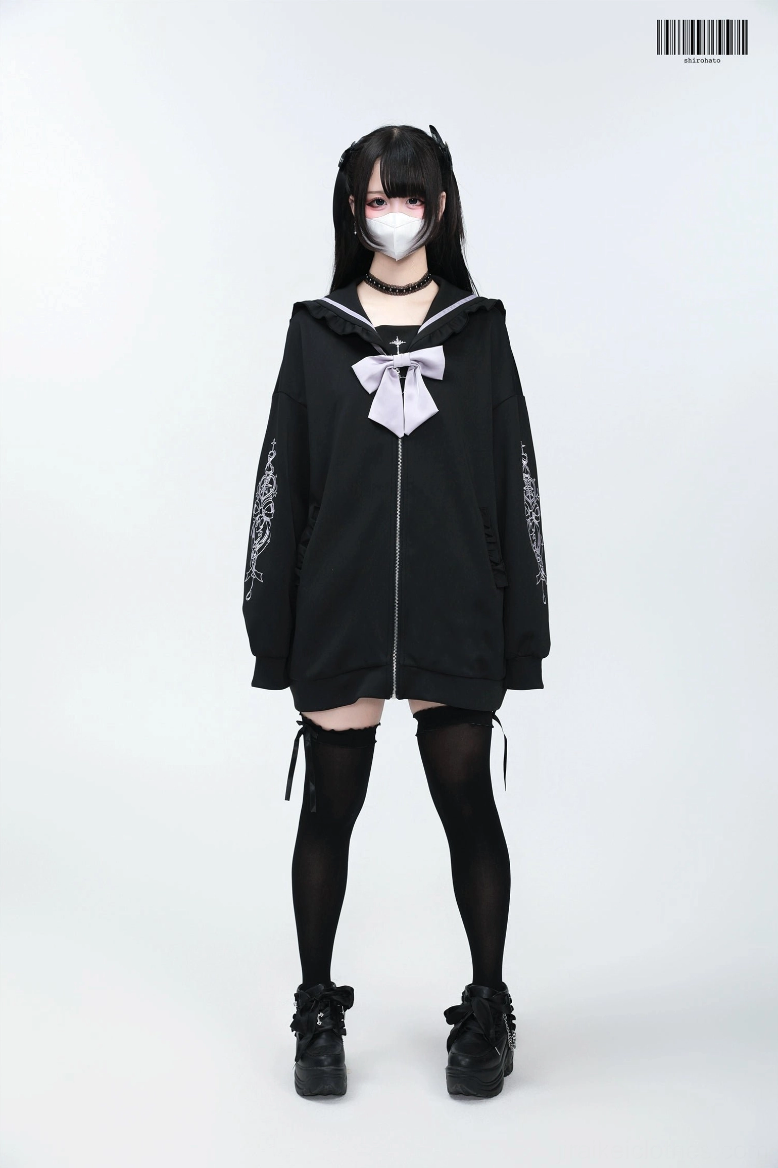 Black Jirai Kei sailor collar jacket with light purple embroidery and bow, dark-haired model with choker wearing thigh-high socks