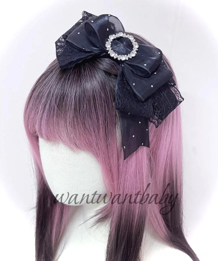 Black satin rhinestone bow jirai kei headband with sparkly dot details and rhinestone buckle center on ombre mannequin front