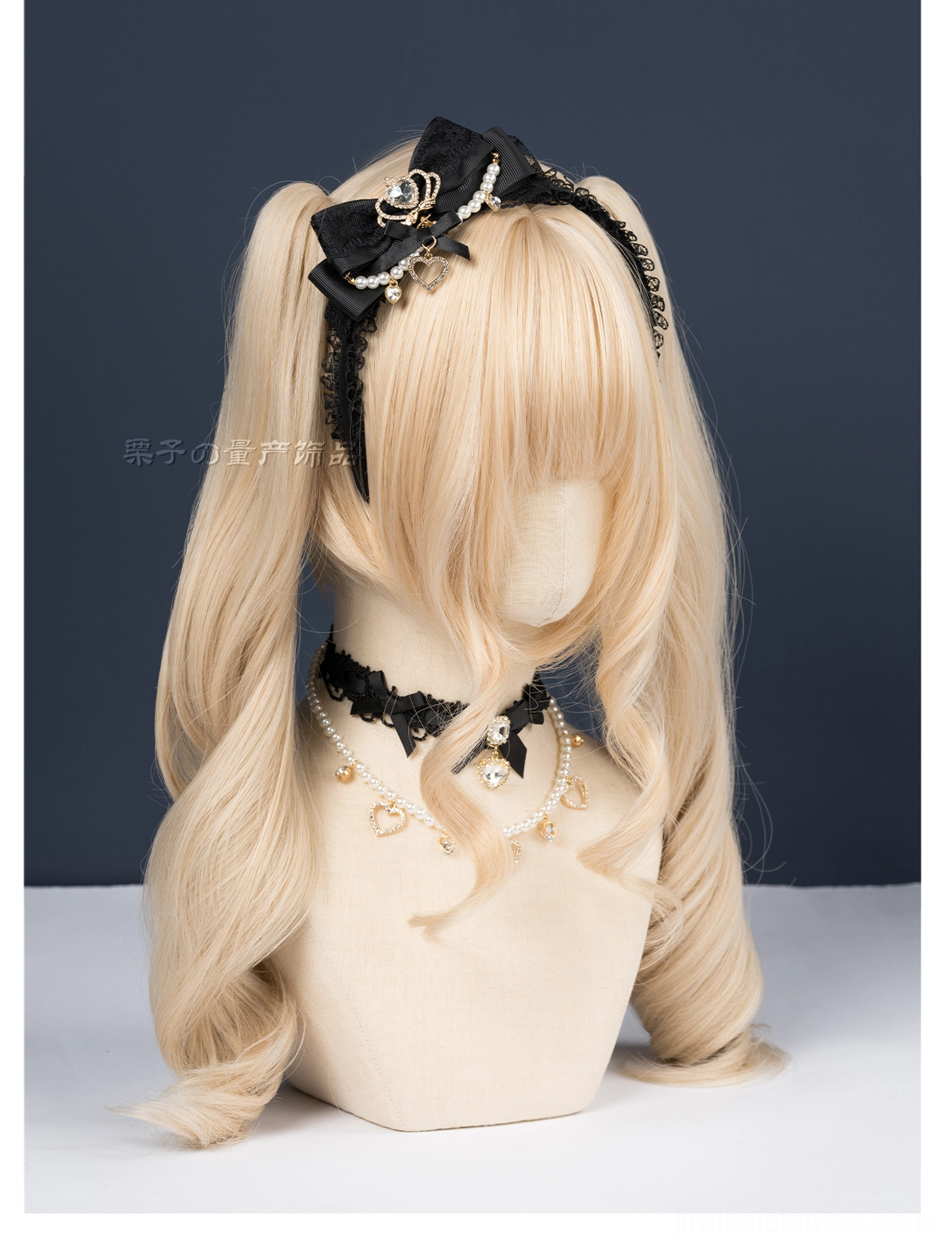 Black ryousangata lace bow headband three-quarter view mannequin head dark backdrop matching black bow choker necklace