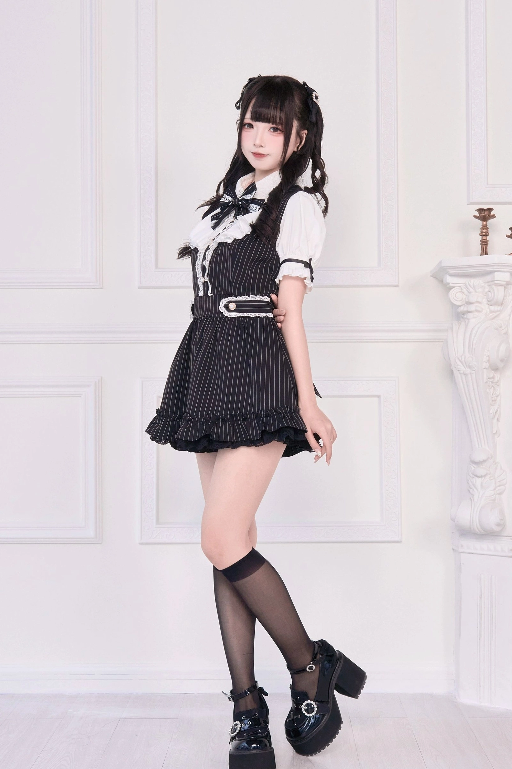 Black striped Jirai Kei maid dress side-front view model ruffled skirt bow collar platform shoes