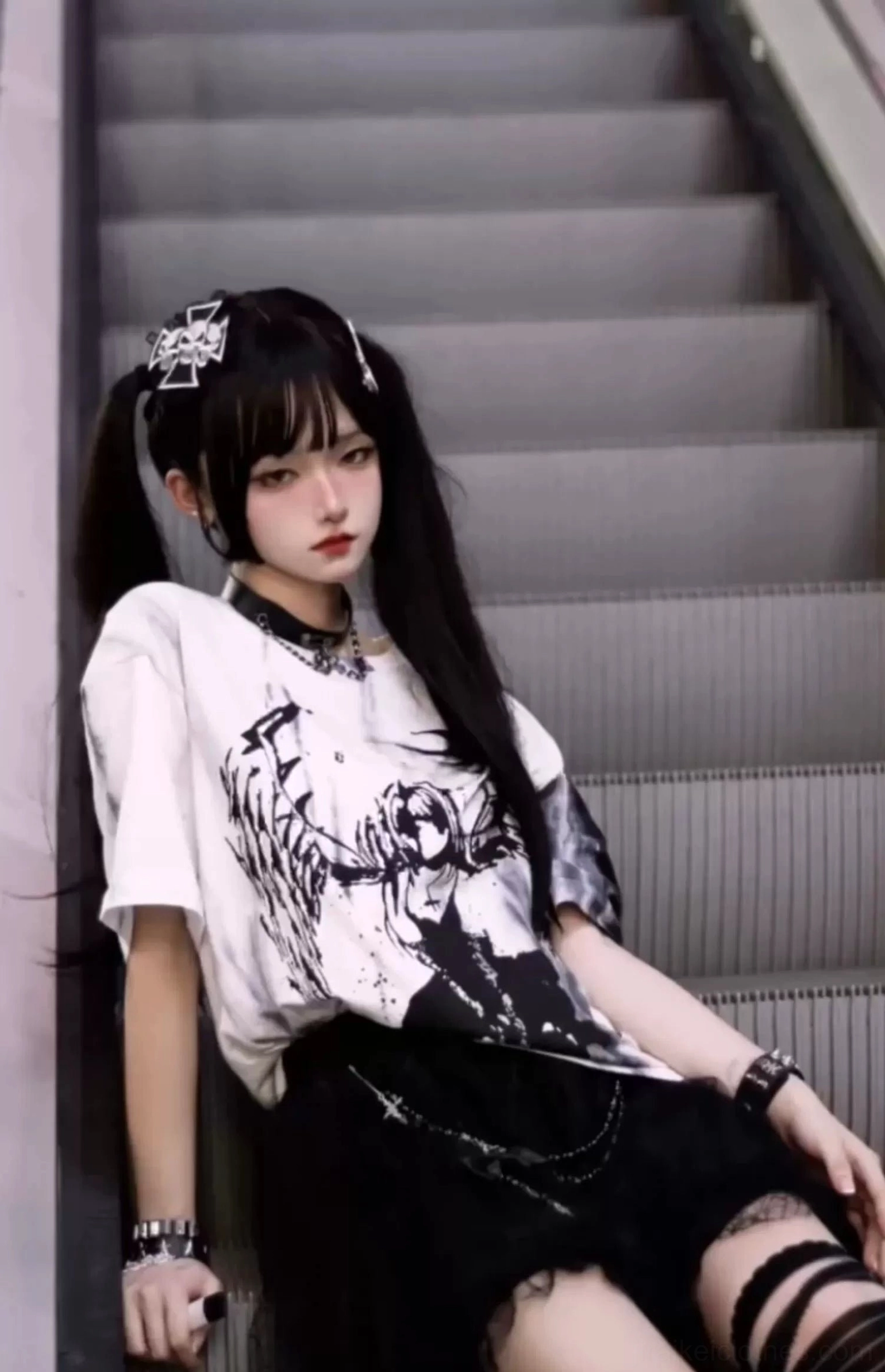 Black tie-dye colorway of celestial angel wings gothic jirai kei t-shirt showing dark moody aesthetic and graphic print