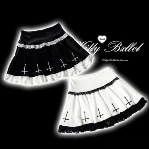 Black velvet Jirai Kei skirt with silver lace trim and white cross embroidery at hem, flat lay studio view on black backdrop