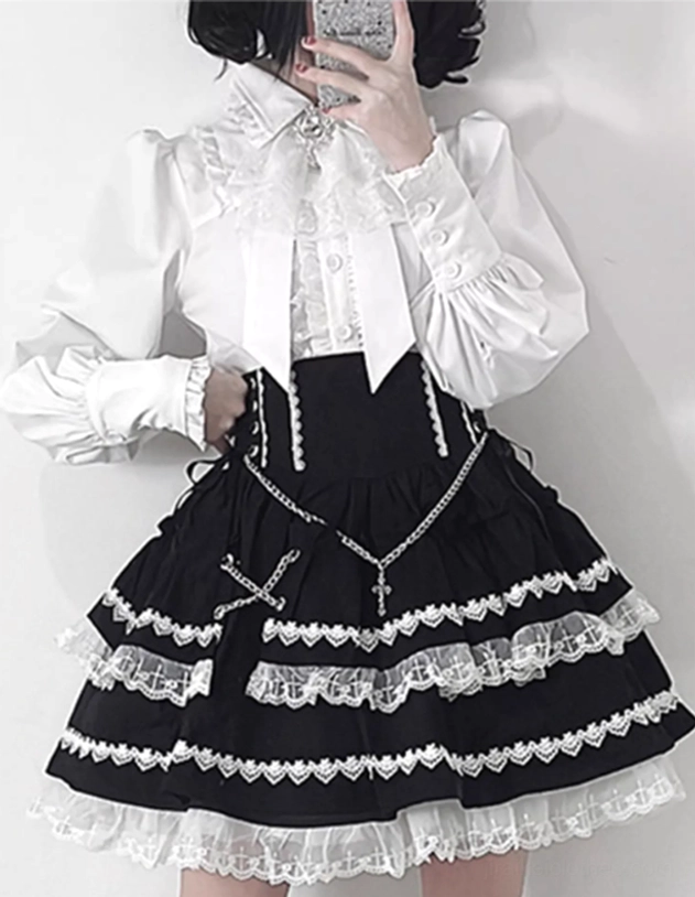 Black and white layered Jirai Kei Gothic Lolita puff skirt front view with lace tulle trim