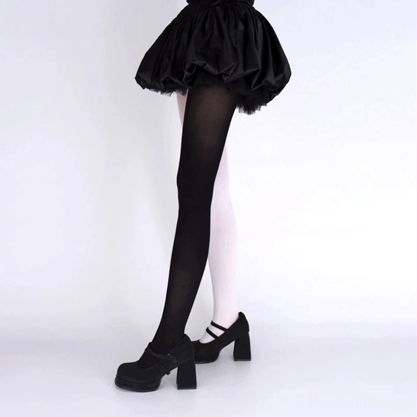 Back view of black and white split velvet pantyhose smooth matte texture short black ruffle skirt