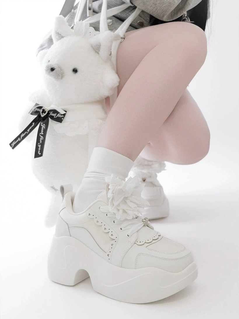 Black and white Jirai Kei platform sneakers color comparison matte black pristine white lace bow ruffle trim chunky platform