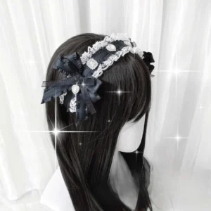 Black and white jirai kei ribbon headband with heart-shaped rhinestones rear view on mannequin with long black hair
