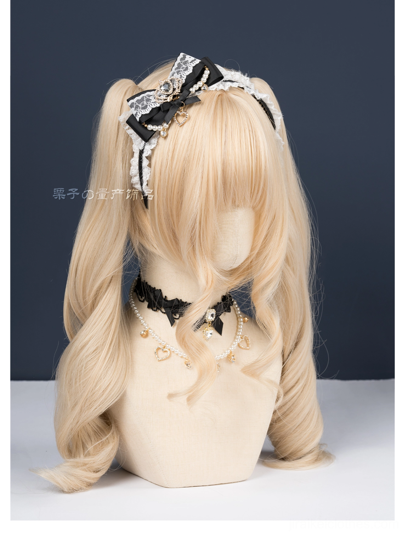 Black and white ryousangata lace bow headband front mannequin view dark blue studio backdrop matching black lace choker