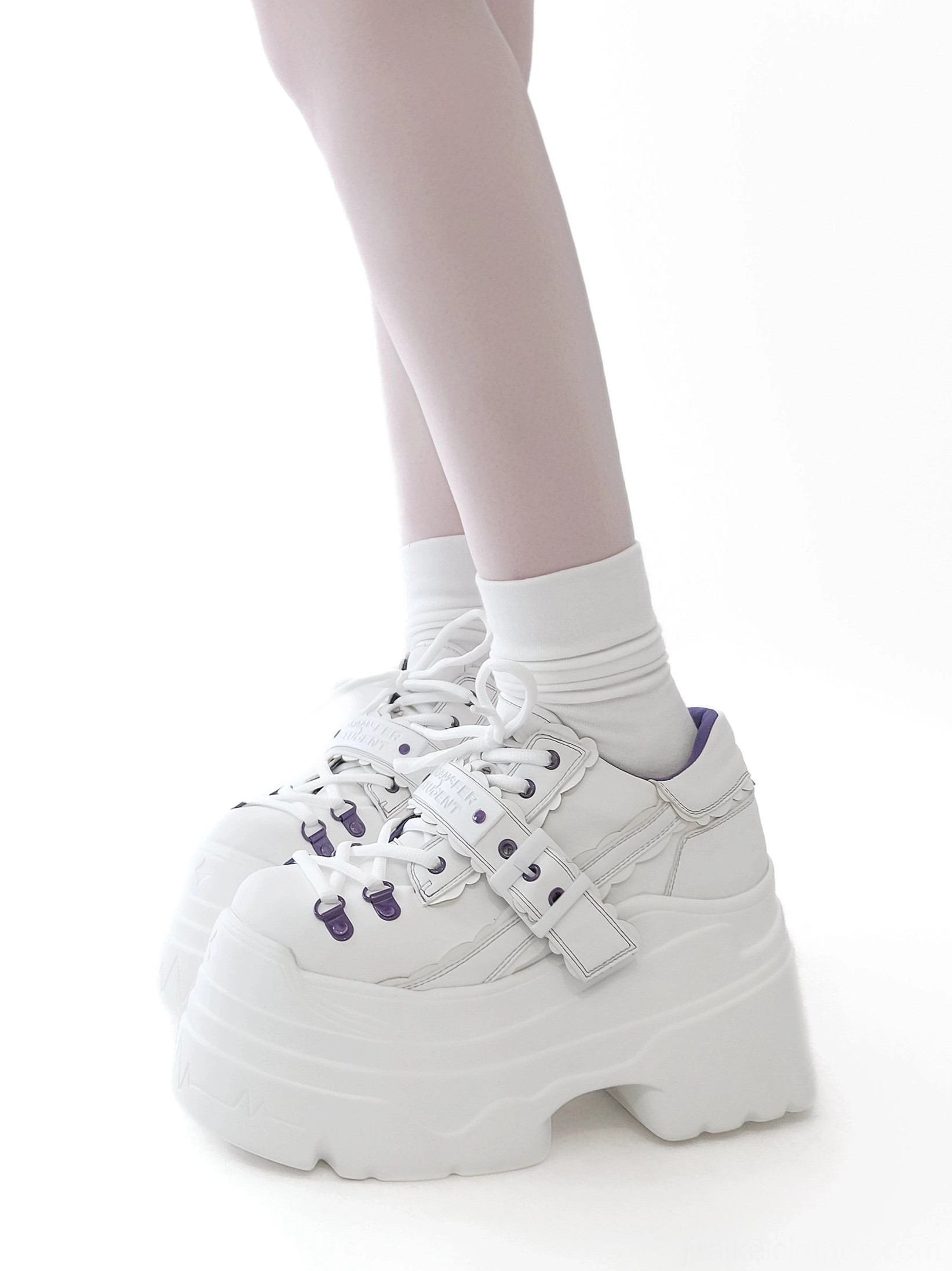 Black and white Y2K jirai kei platform shoes product comparison showing contrast color design, strap buckle details, and chunky sole profile