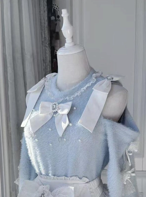 Blue off-shoulder fuzzy Jirai Kei sweater on flat mannequin with white satin removable bow, pearl embellishments, and lace details, gothic lolita aesthetic product view
