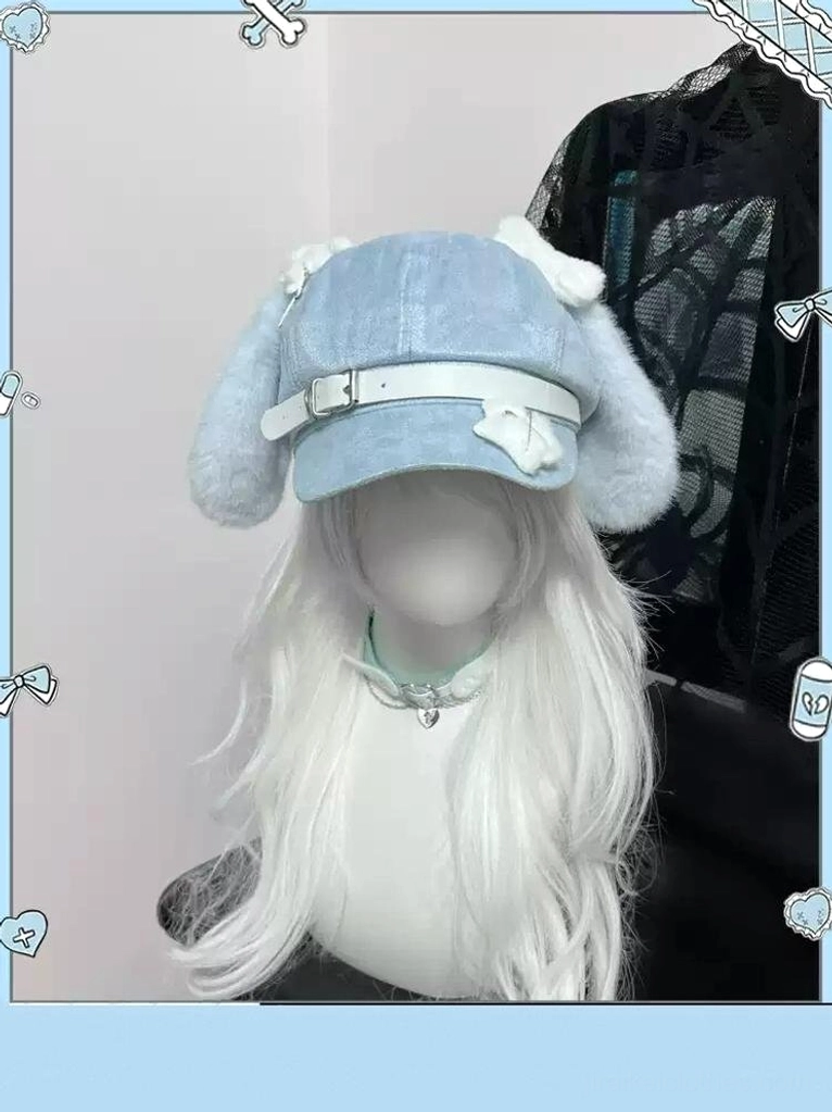 Rear view of blue puppy ear beret on mannequin with white wig and matching silver choker, Polaroid frame background aesthetic