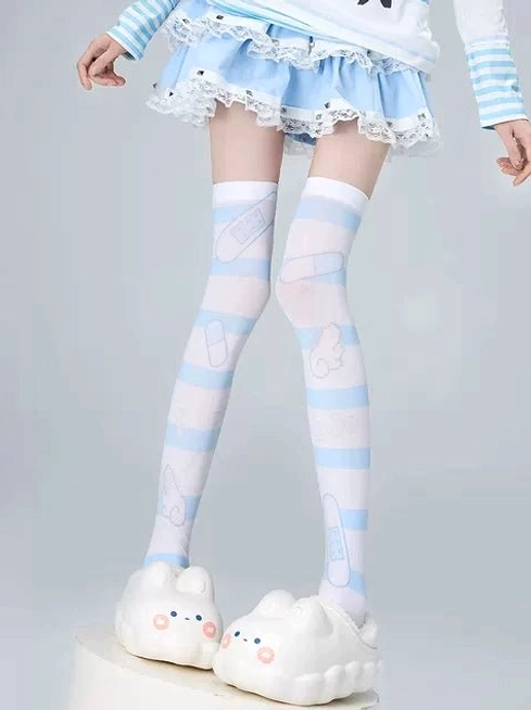 blue striped thigh-high hold-up socks with bandage and bunny prints jirai kei sweet lolita coordinate aesthetic