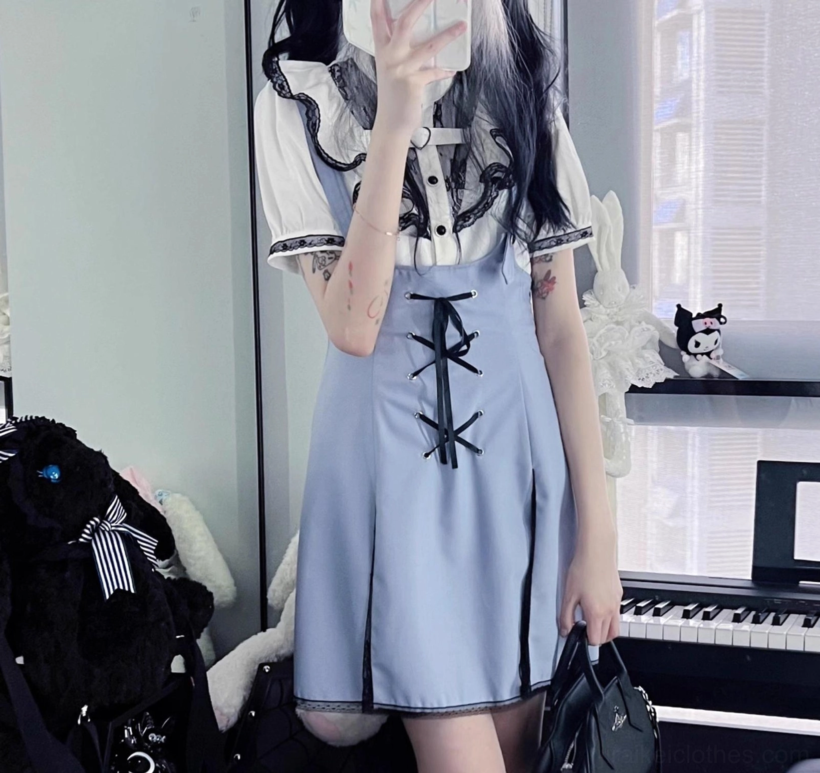 Blue and white jirai kei outfit set with lace-up front contrast color trim and A-line suspender skirt