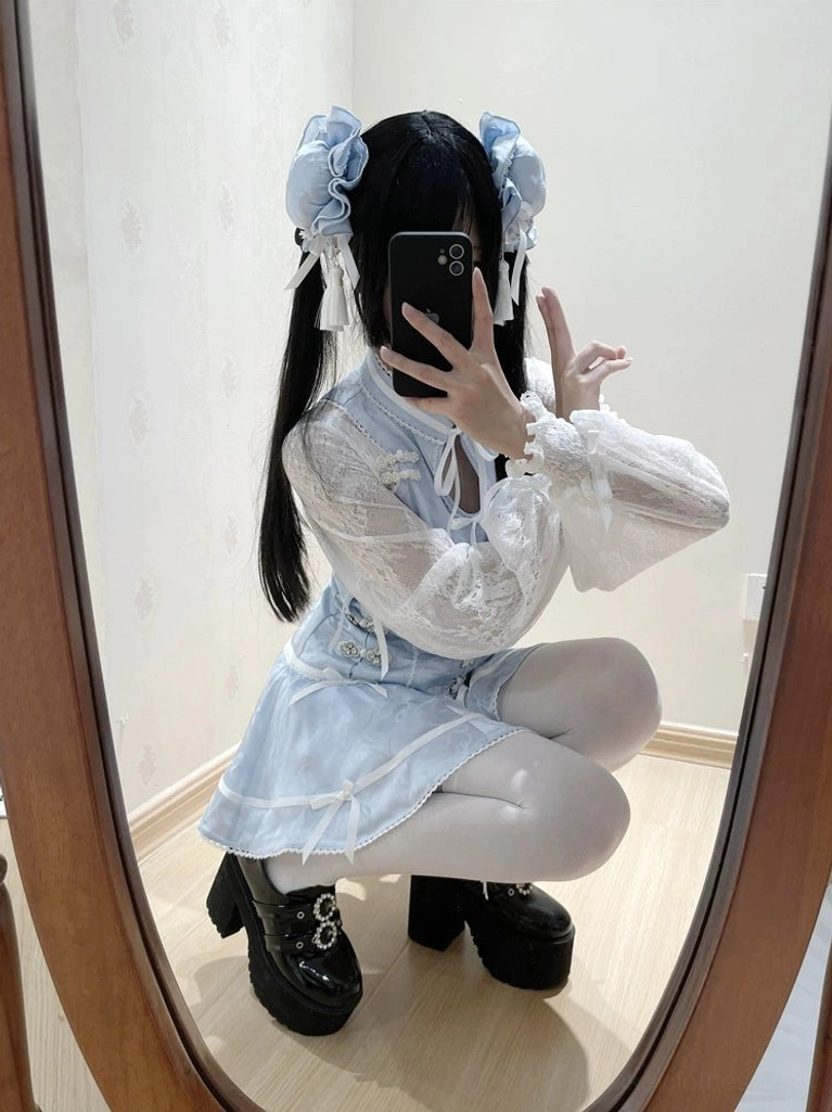 Blue fabric white lace jirai kei cheongsam dress set complete ensemble with shorts showing corset silhouette and decorative bow hem details
