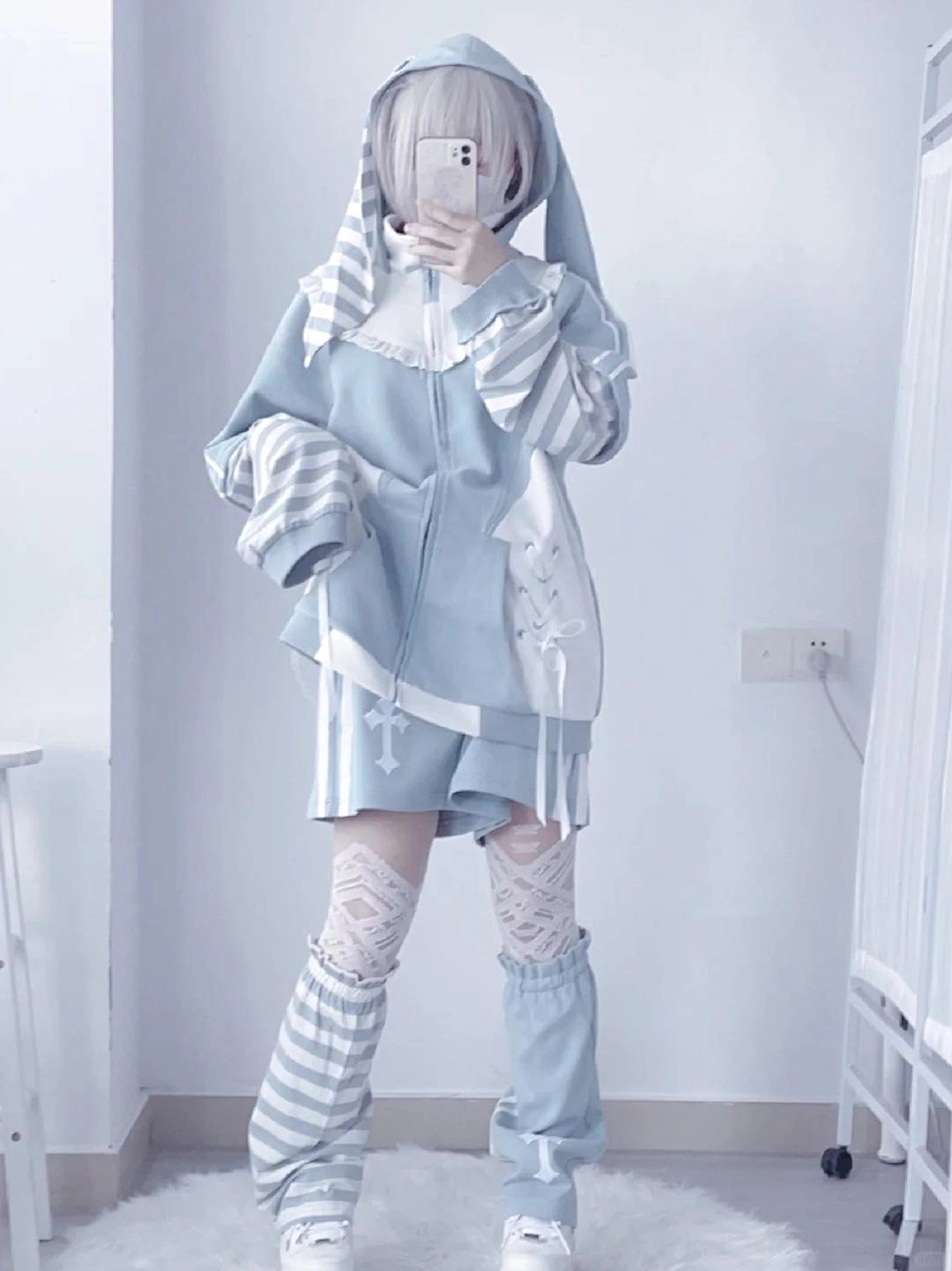 Blue and white striped Tenshi Kaiwai leg warmers pair coordinating with hoodie ensemble leg accessory styling