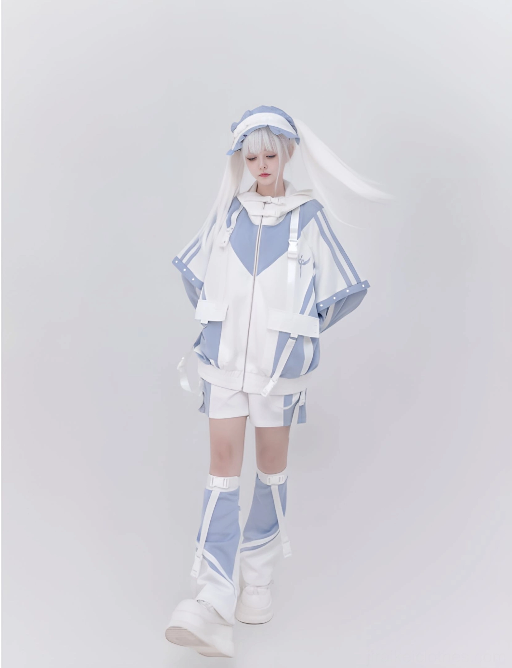 Blue-white techwear hooded jacket and shorts set on white-haired lolita model showing contrast color blocking and short bottoms