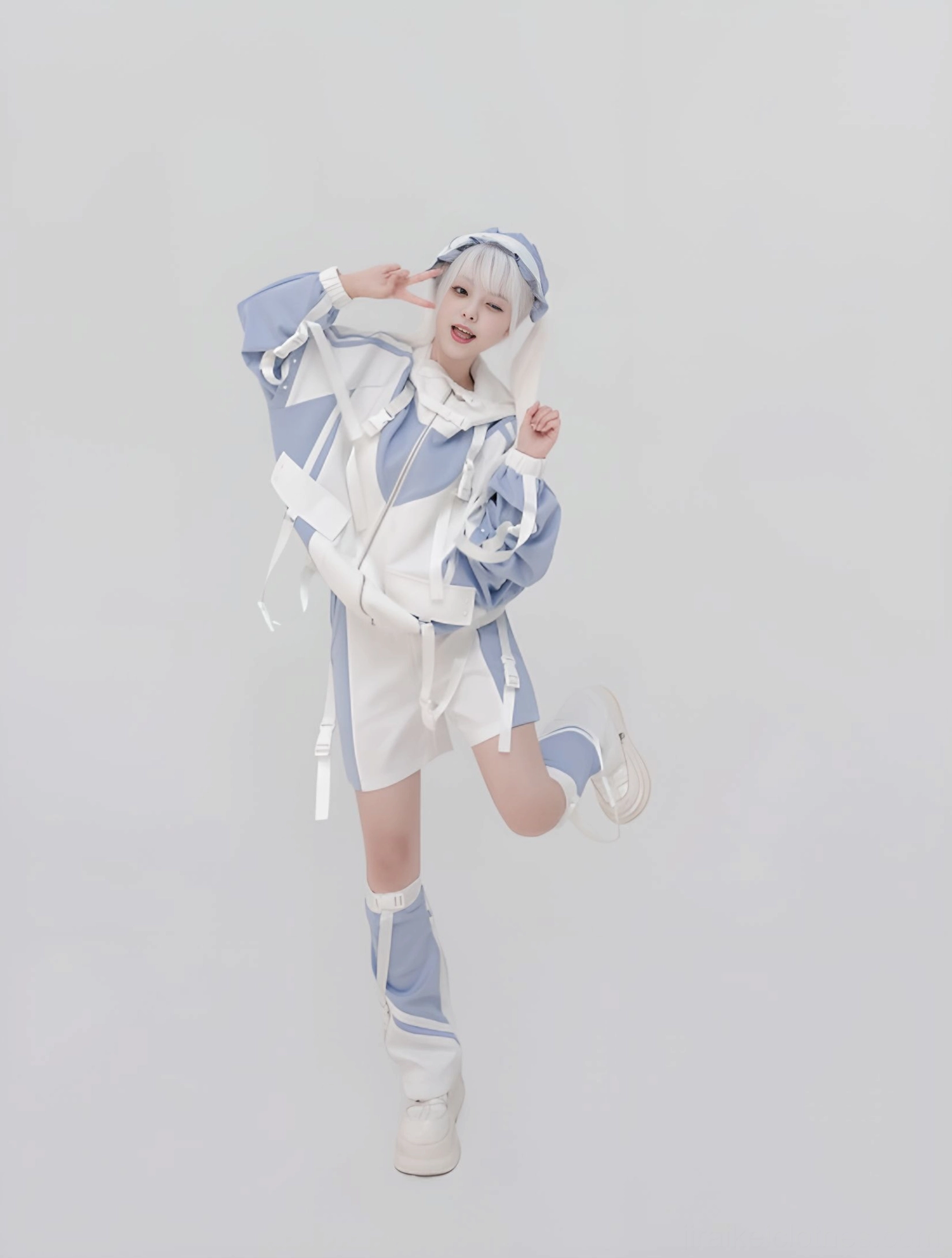Blue-white Y2K sporty lolita jacket and leg warmers set with matching headpiece one-legged dynamic pose