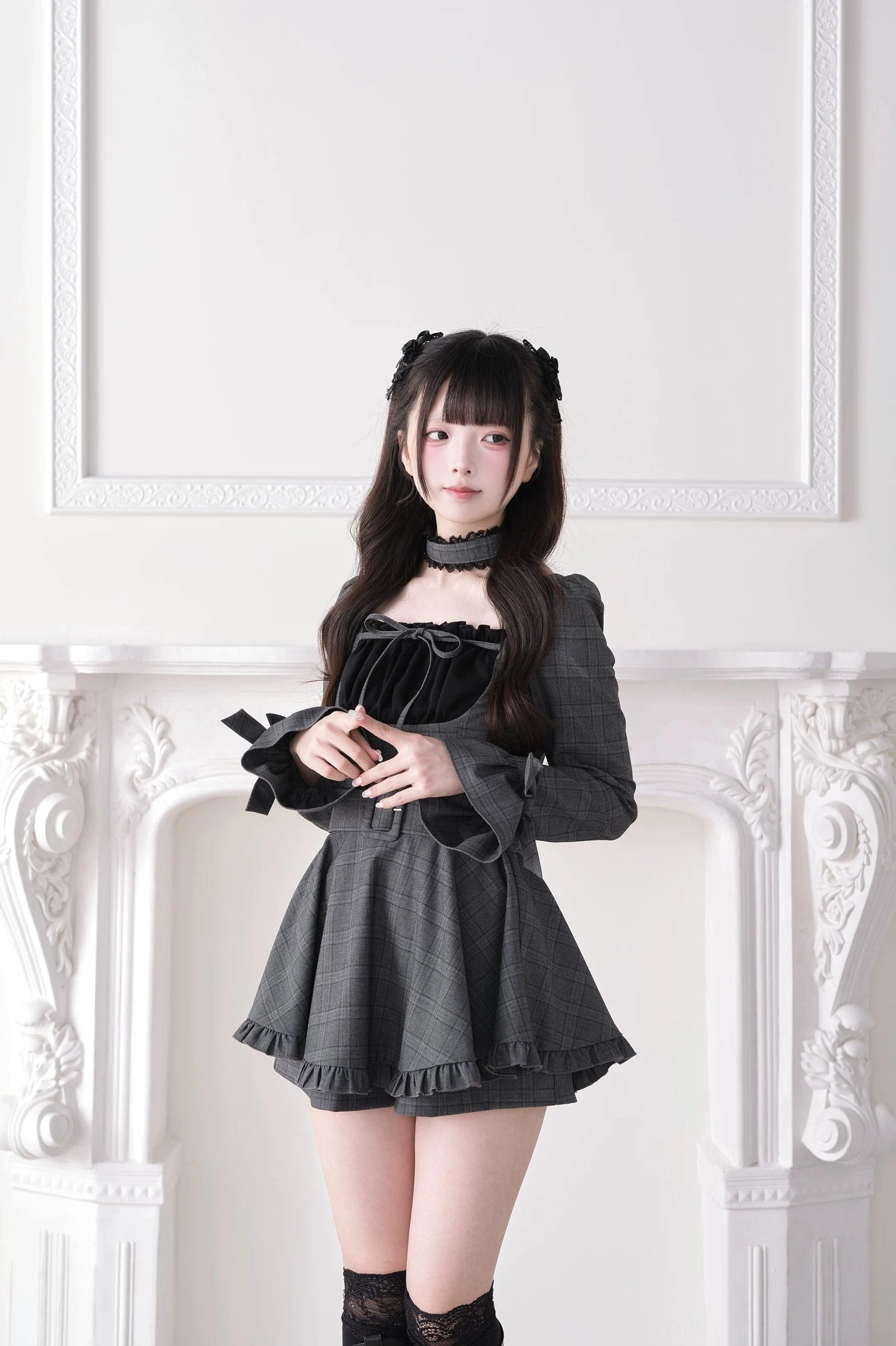 Brown tartan plaid dress front three-quarter view with velvet bow ruffled hem and lace choker