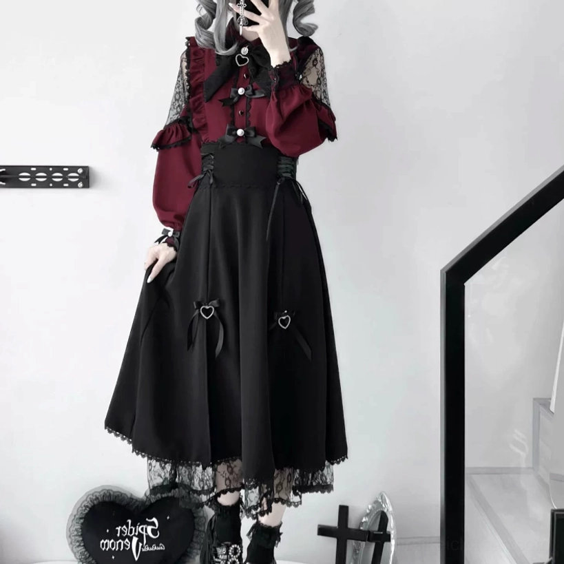 Burgundy ruffled jirai kei blouse with black high-waist skirt half body front-side view grey curly twin hair model complete set