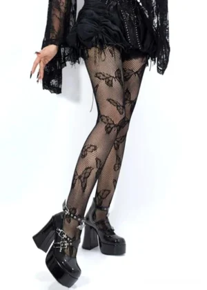Butterfly mesh tights side rear view gothic subculture styling with lace top short skirt and buckle platform heels Jirai Kei look