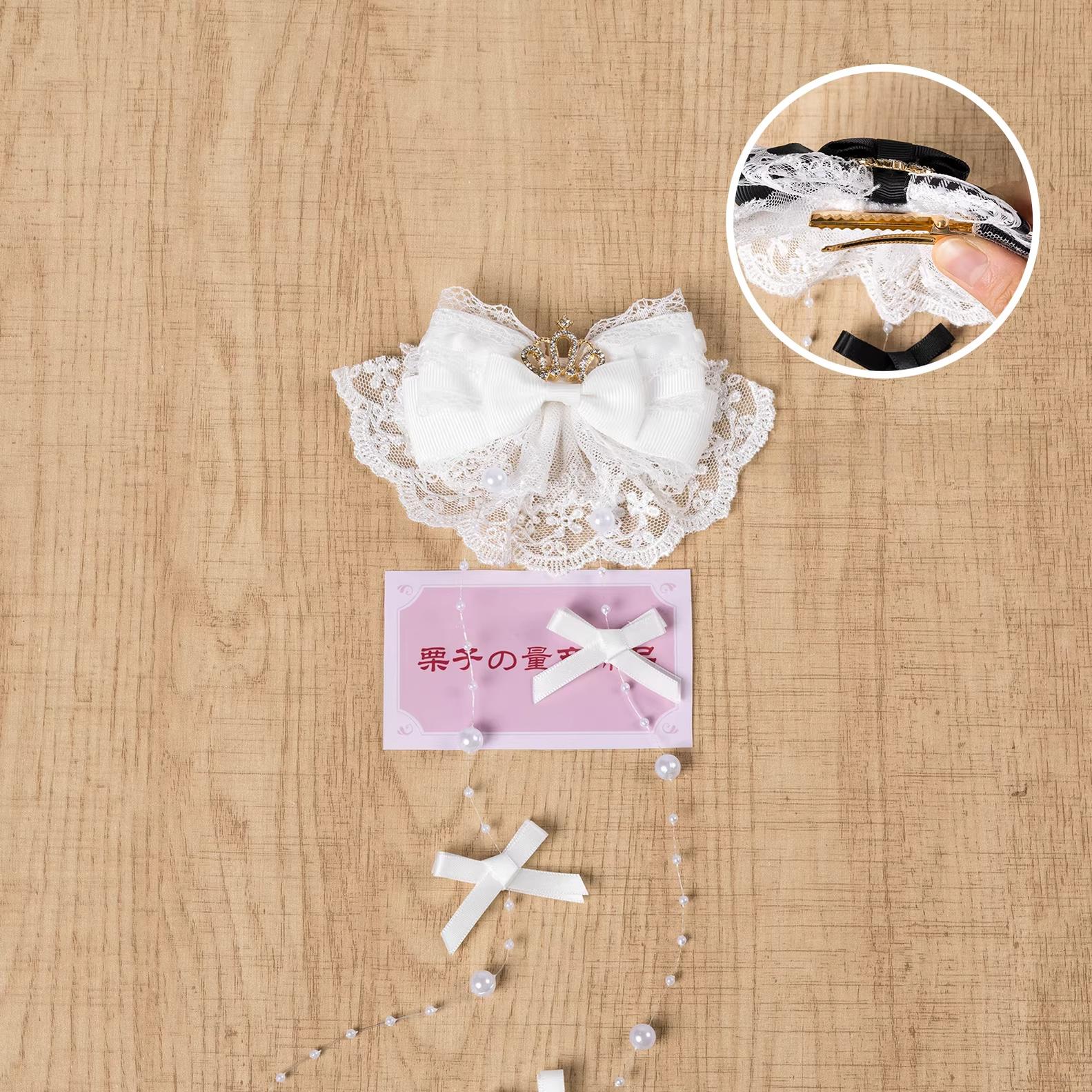 Pure white Jirai Kei hair clip with elegant lace bow, rhinestone crown, and pearl chains - left-opening variant display