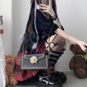 Envelope shaped jirai kei ita crossbody bag back view showing transparent display window black exterior dark punk style