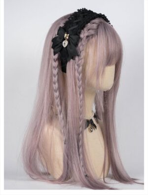 Black Jirai Kei lace headband with satin bow and heart rhinestone pendants worn on mannequin with braided lilac wig, right side view showcasing cross-over ruffled lace design and detailed embellishments