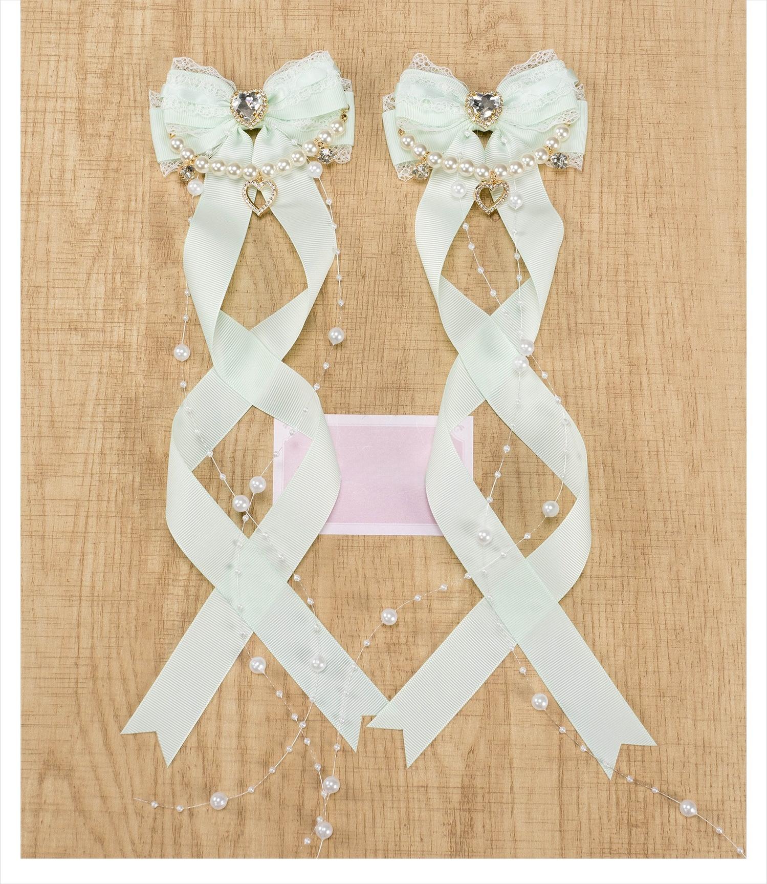 Jirai Kei light green bow hair clips with ribbon knit fabric pearl chain trim and decorative rhinestone heart