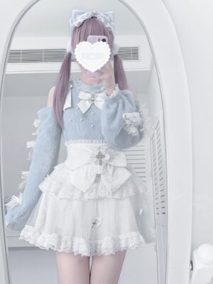 Blue and white off-shoulder fuzzy sweater with pearl embellishments and layered tulle skirt with cross accents, front full-length modeling shot showcasing Jirai Kei fashion styling