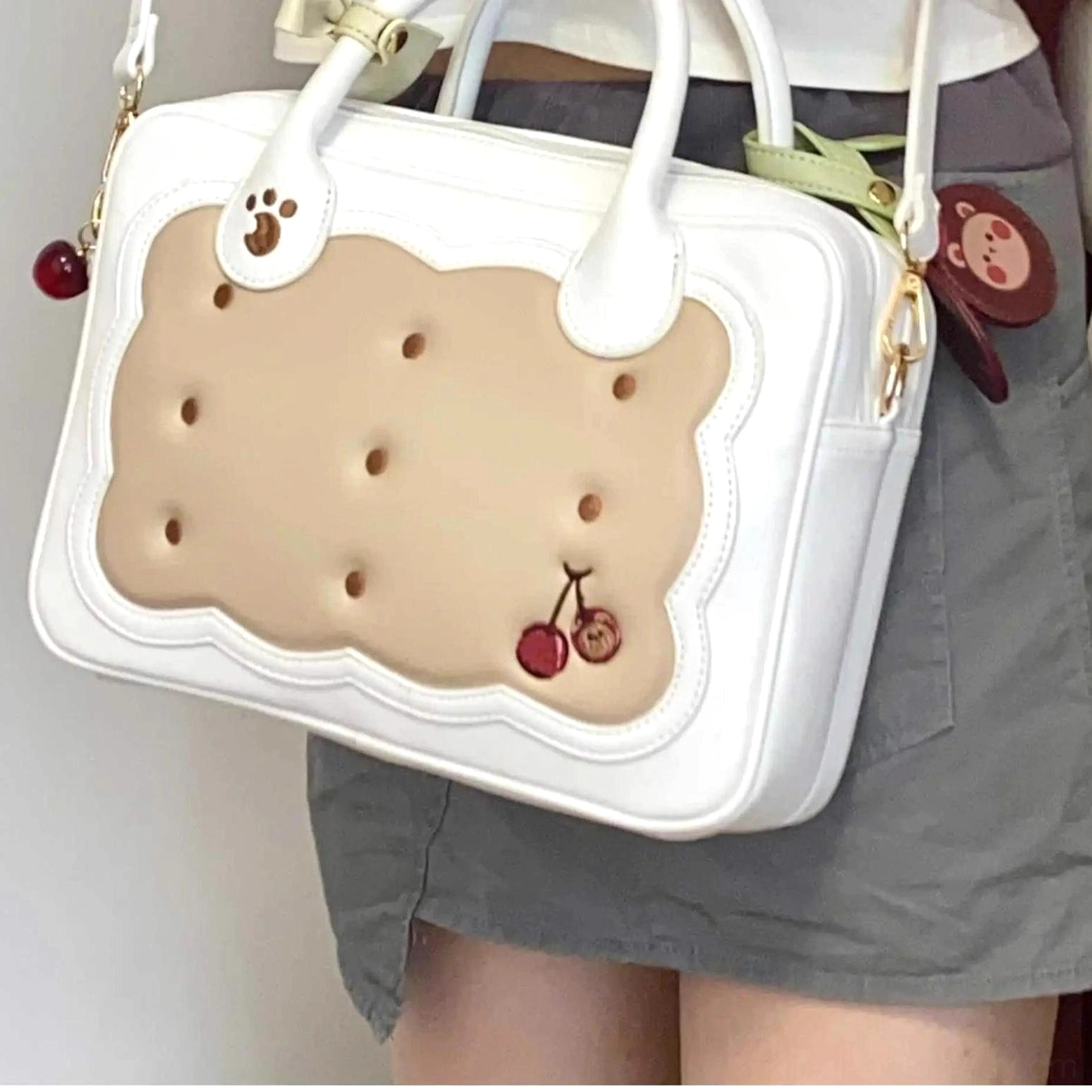 Jirai Kei cherry bear cookie bag worn as crossbody on model festival concert outfit coordination styling inspiration