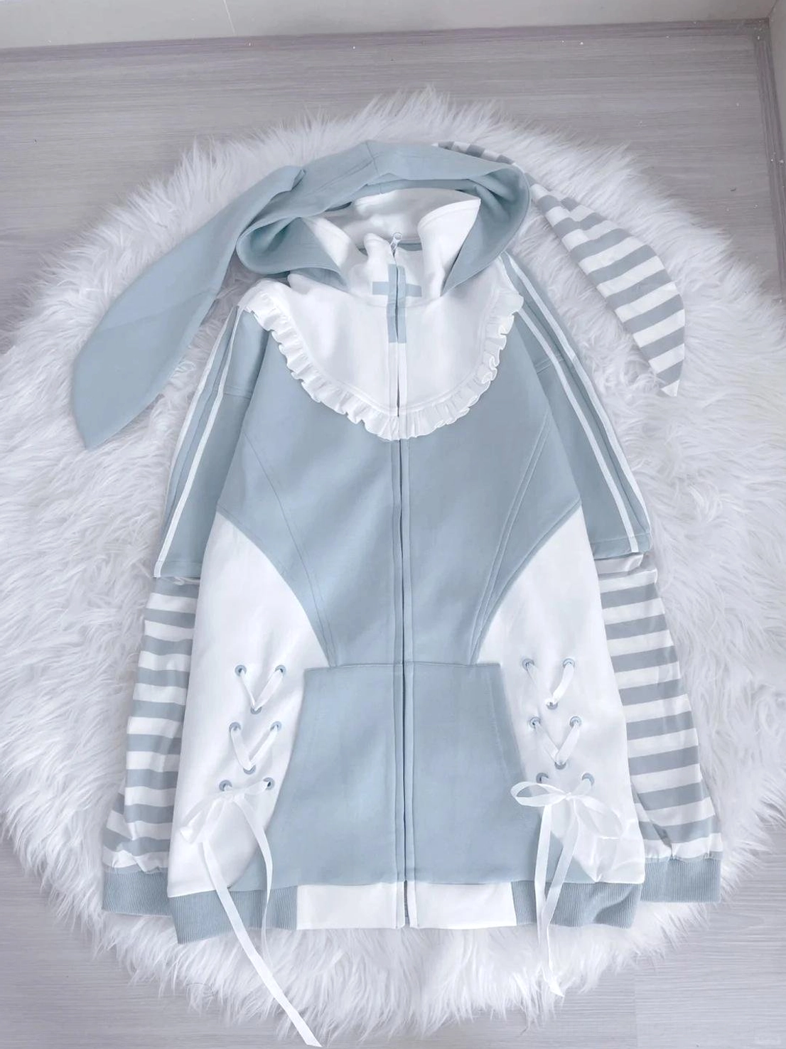 Complete Tenshi Kaiwai hoodie set laid flat displaying all components hoodie shorts leg warmers socks and accessories