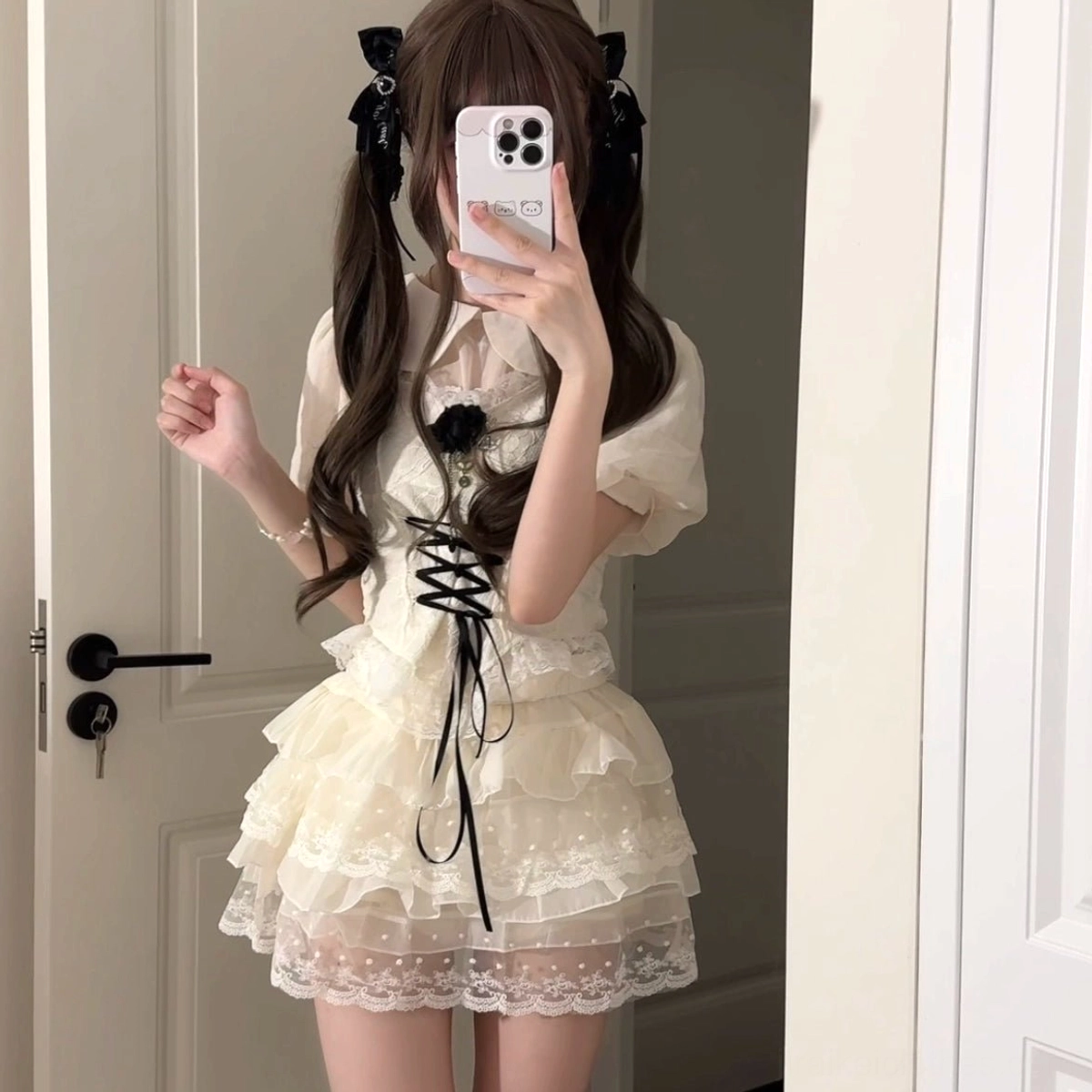 Cream beige Jirai Kei sweet gothic dress set front mirror selfie with short puff sleeves black corset lace-up tiered lace skirt