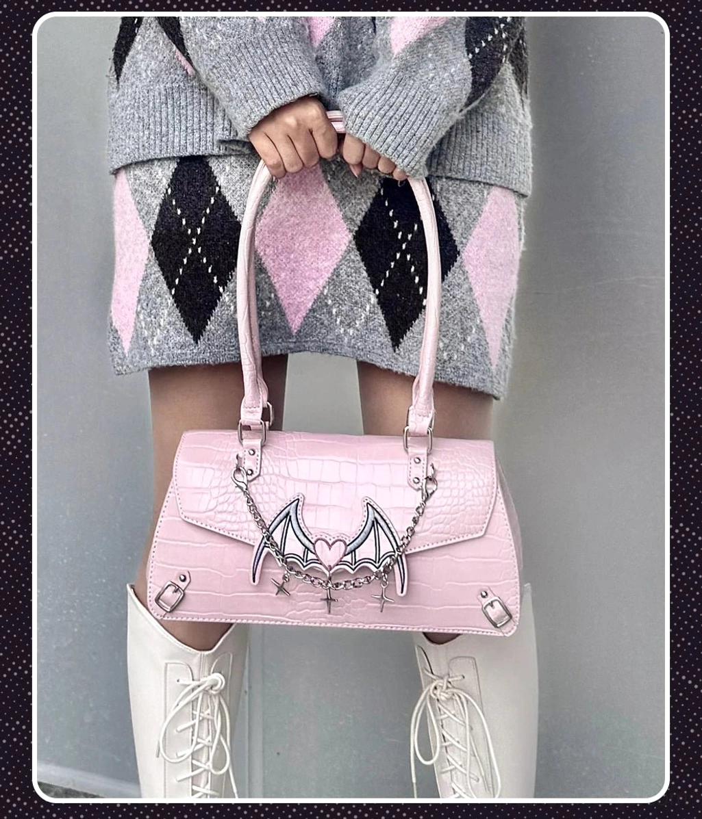 Croc texture bat handbag detail shot showing genuine crocodile pattern embossing and premium PU leather quality and construction