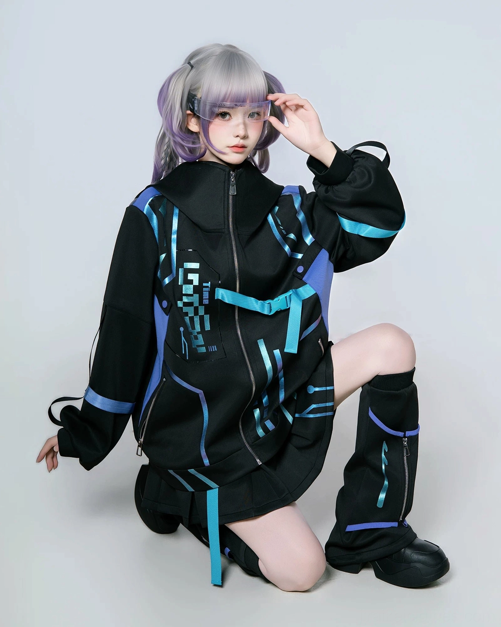 Cyberpunk techwear Jirai Kei outfit featuring gradient color-blocked jacket panels, adjustable leg warmers with elastic, and complete coordinated aesthetic styling