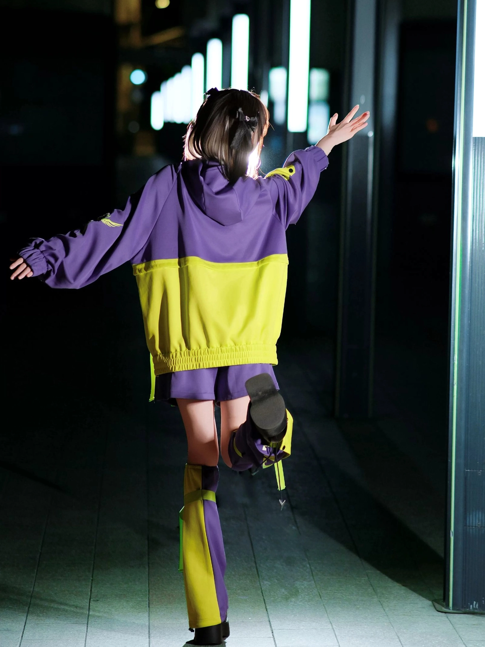 Purple yellow cyberpunk jirai kei hoodie set back view color block design matching leg guards platform boots brown hair model