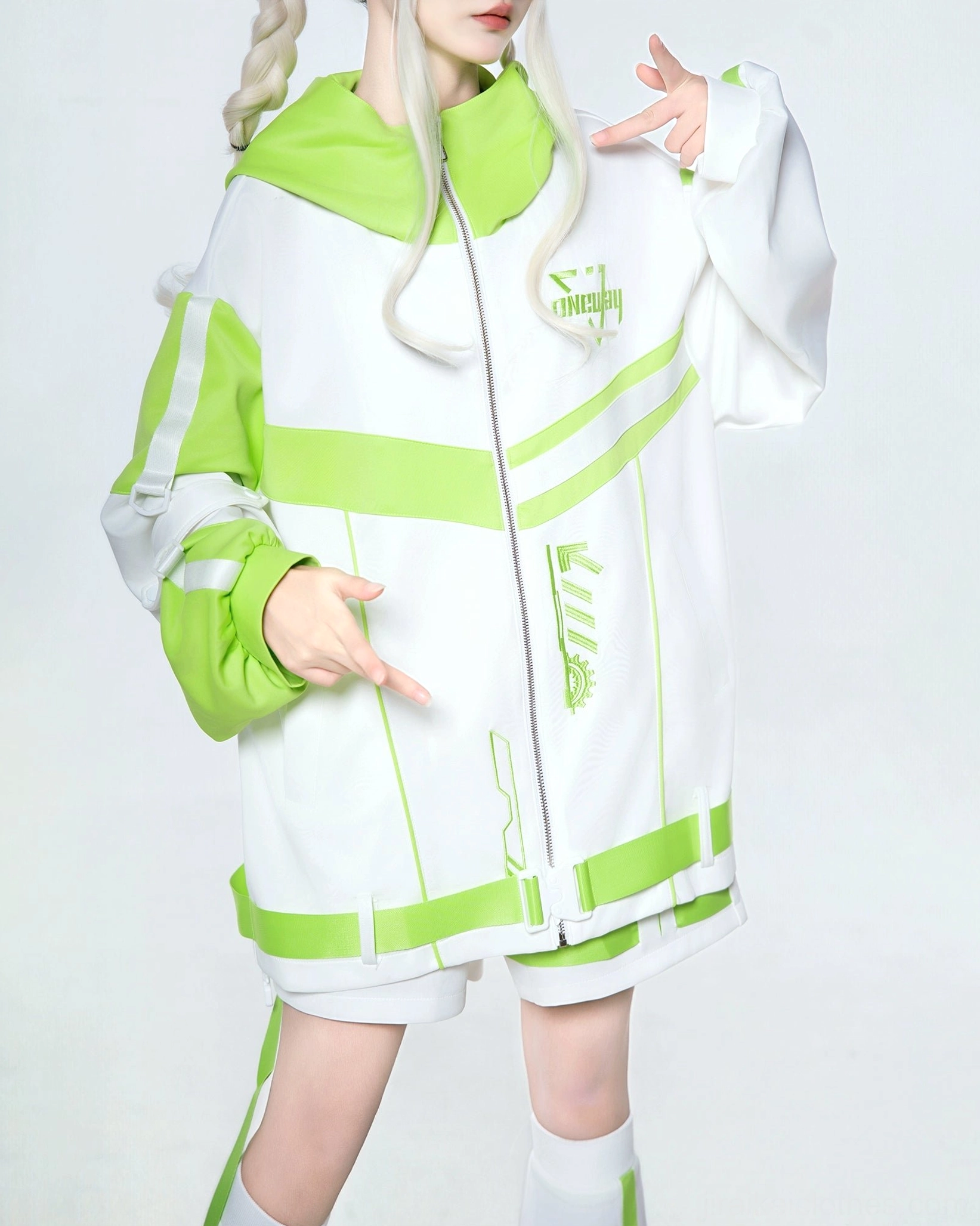 Cyberpunk oversized hoodie detail - close-up of drawstring construction and hood design elements in neon color scheme