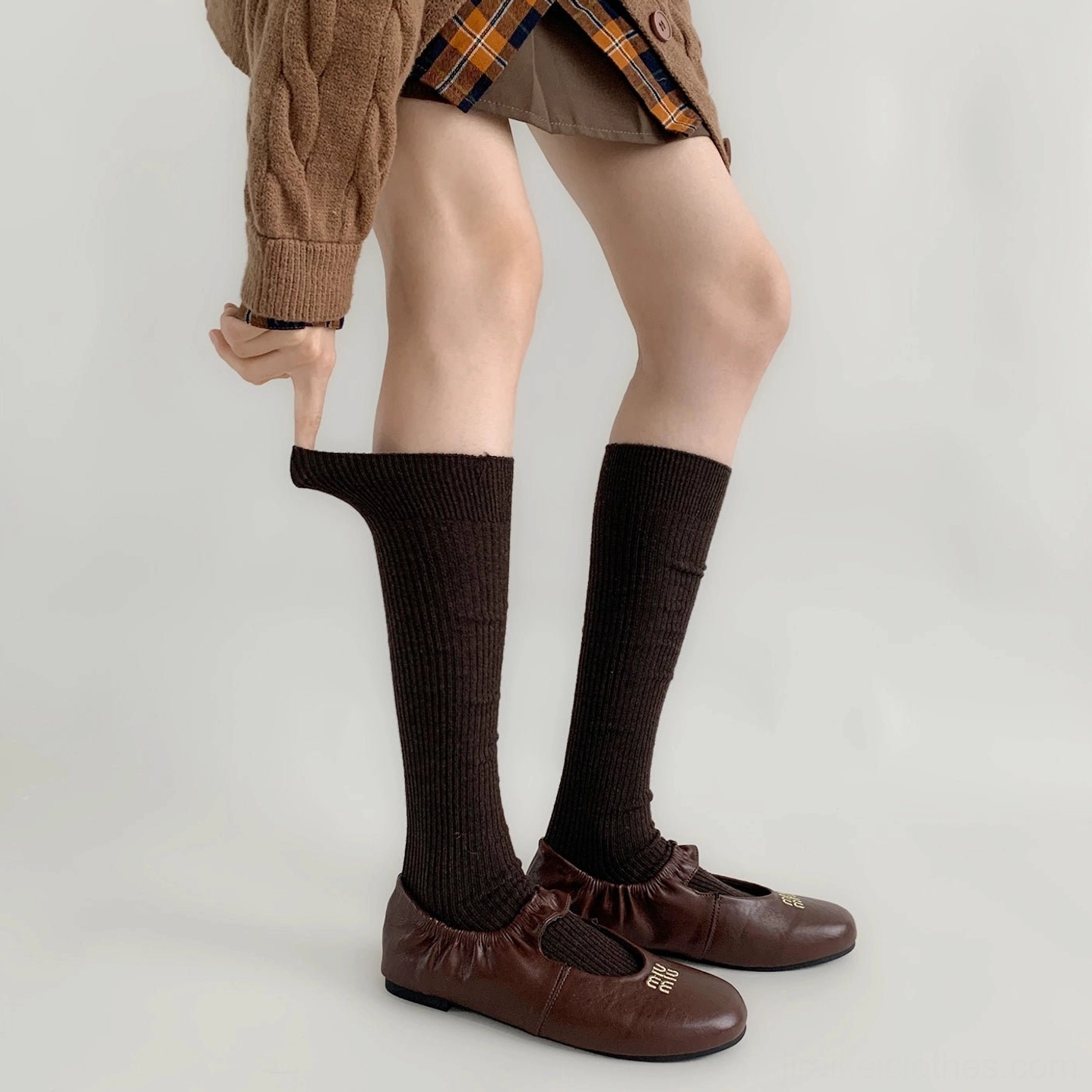 Dark coffee brown calf-length Jirai Kei ribbed socks worn styling detail shot