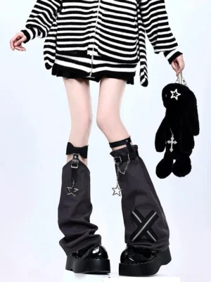 Dark gray Jirai Kei leg warmers with star and chain decorations, adjustable garter straps, worn with striped sweater and black mini skirt, front view showcase of X-zipper punk aesthetic