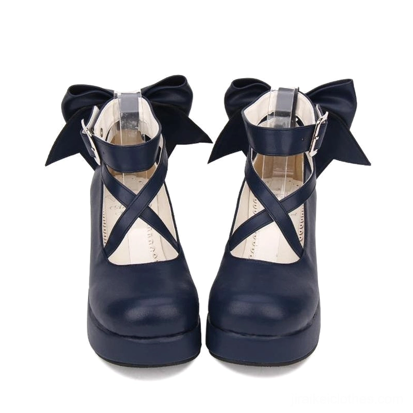 Dark navy blue Jirai Kei platform shoes featuring back bow, crisscross ankle strap with metal buckle, pink inner insole, front flat view