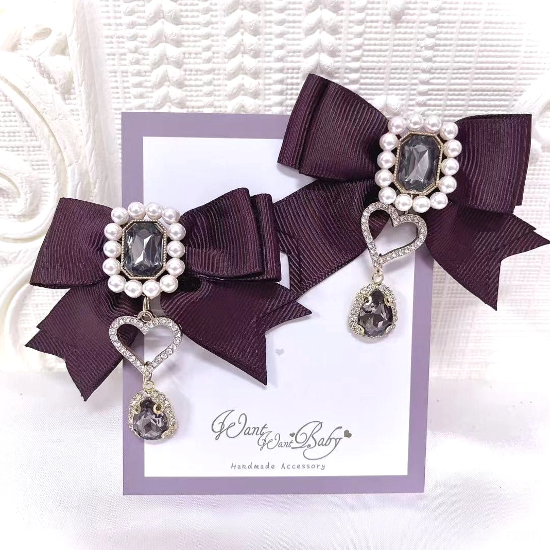 Dark wine red Jirai Kei bow hair clips carded display featuring large pearl and dark crystal center with heart link and teardrop pendant