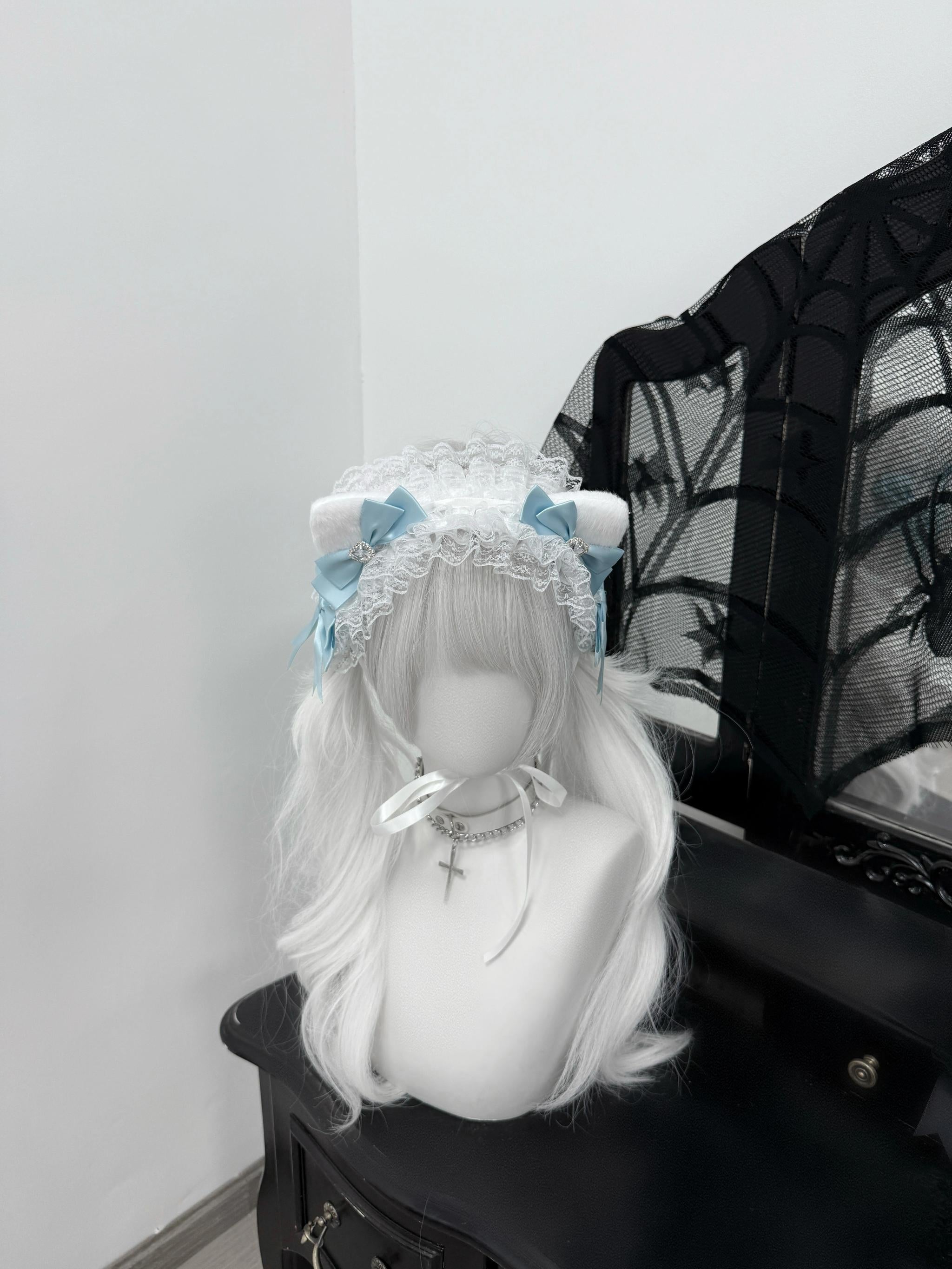 Complete jirai kei cat ear headband with lace base fuzzy ears and satin embellishments front styling