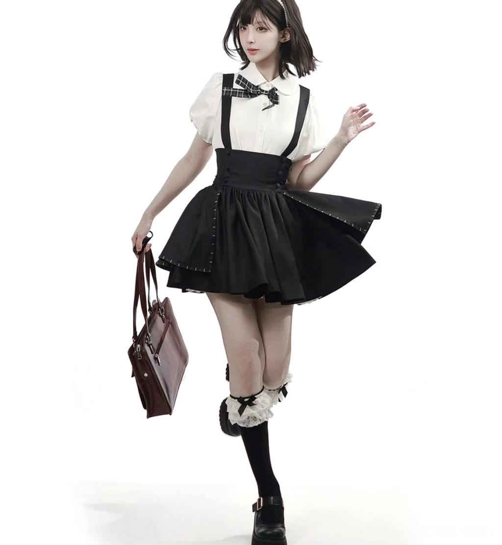 Jirai kei bubble sleeve blouse and suspender skirt detachable components close-up showing plaid bow tie embroidered collar panel waist tie details