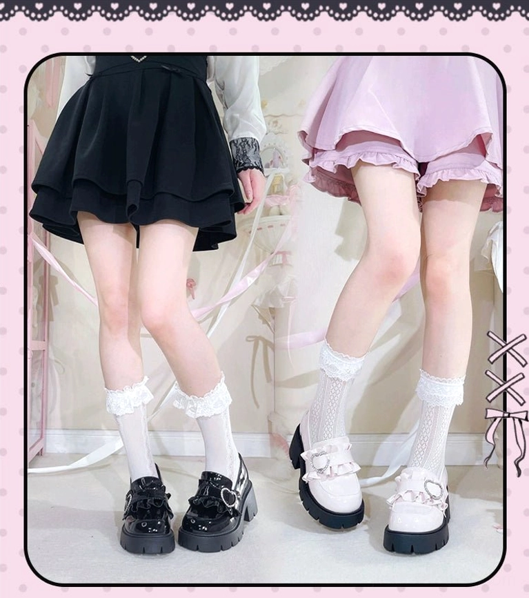 Two pairs platform loafers black and white Jirai Kei shoes full lower leg view models wearing frilly socks pink lace-framed backdrop comparison shot