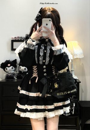 Gothic Lolita Jirai Kei blouse coordinate set with black and white lace detailing, off-shoulder design, and pearl heart buttons worn with tiered ruffle skirt in bedroom aesthetic