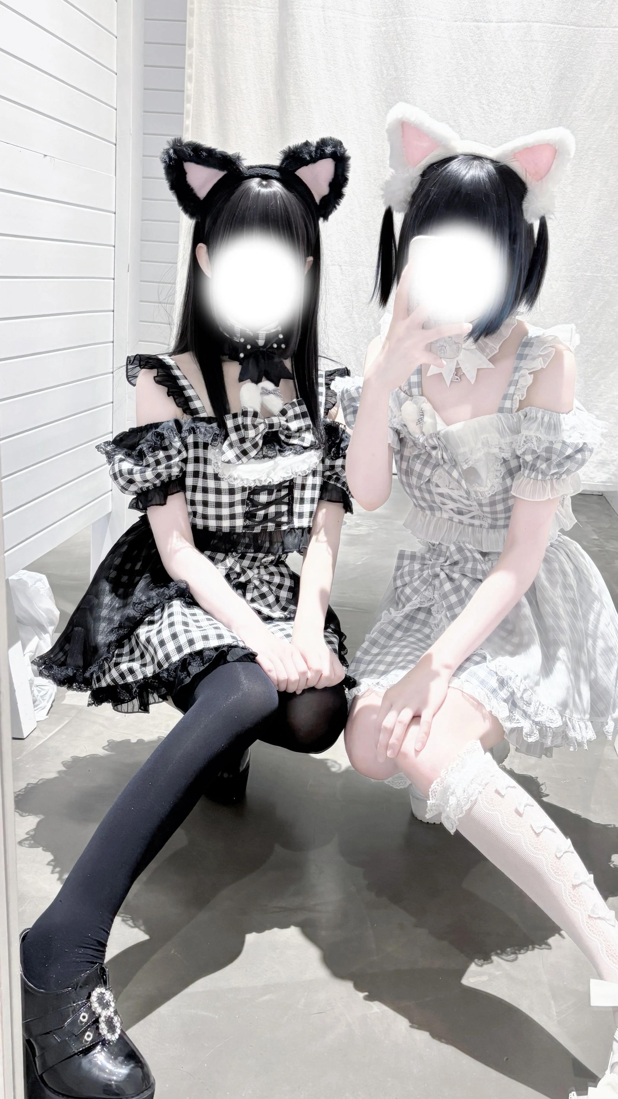 Jirai kei gingham maid outfit two-piece set low angle full body shot with black cat ears and stockings indoor fashion photography