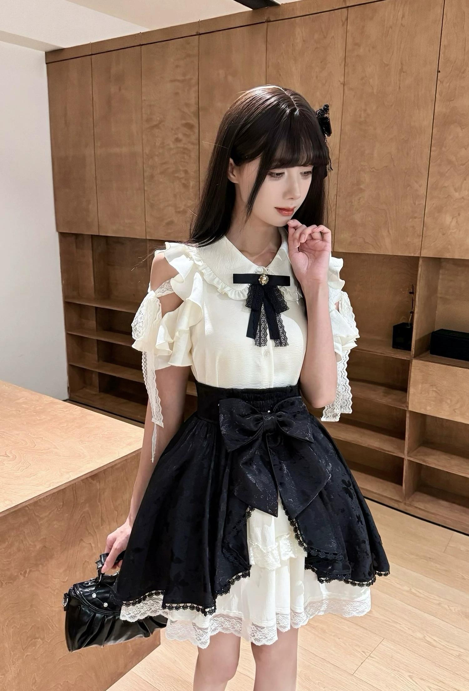 Seiso Kei cold-shoulder ruffle blouse with detachable bow tie and butterfly jacquard reversible skirt two-piece set front view full body