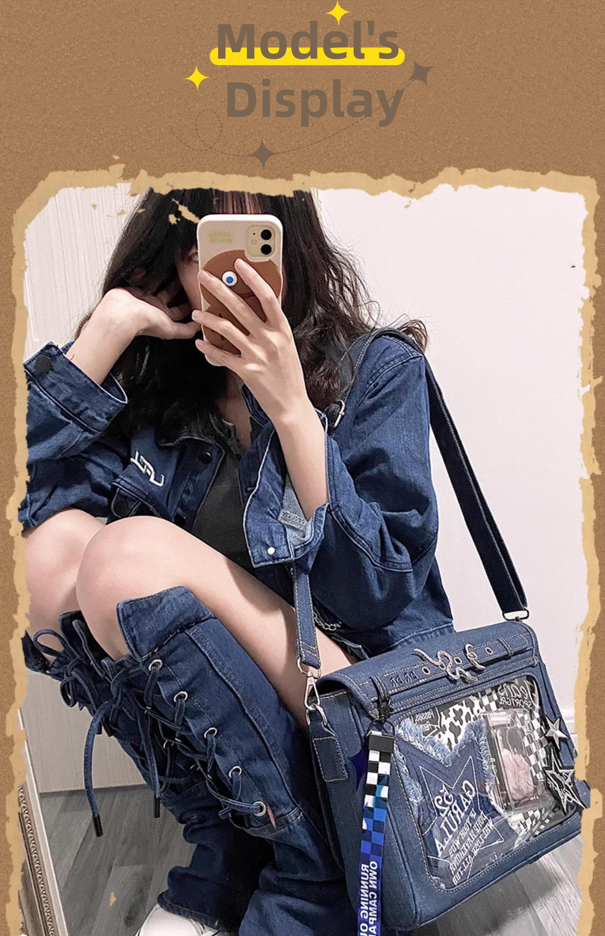 Denim itabag crossbody bag mirror selfie angle with model in denim coordinate set squatting position, clear display window with blue-white ribbon trim decoration